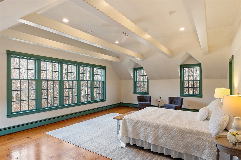 1019 North Road Carlisle, MA 01741 - Photo 13 of 31 a bedroom with a large bed and a large window
