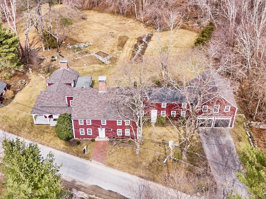 1019 North Road Carlisle, MA 01741 - Photo 31 of 31 an aerial view of residential houses with outdoor space