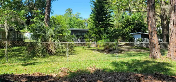 a garden view with a sitting space