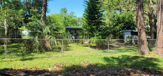 a garden view with a sitting space