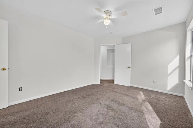 a bathroom with a toilet a sink and a bathtub
