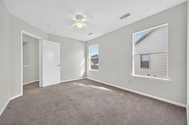 an empty room with windows