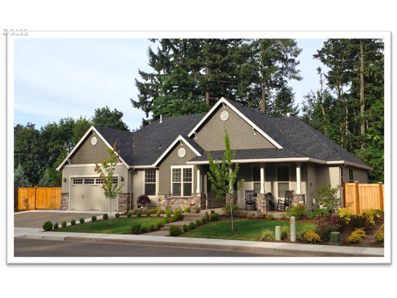 6119 Graystone Loop Springfield, OR 97478 - Photo 1 of 1 a front view of a house with a yard