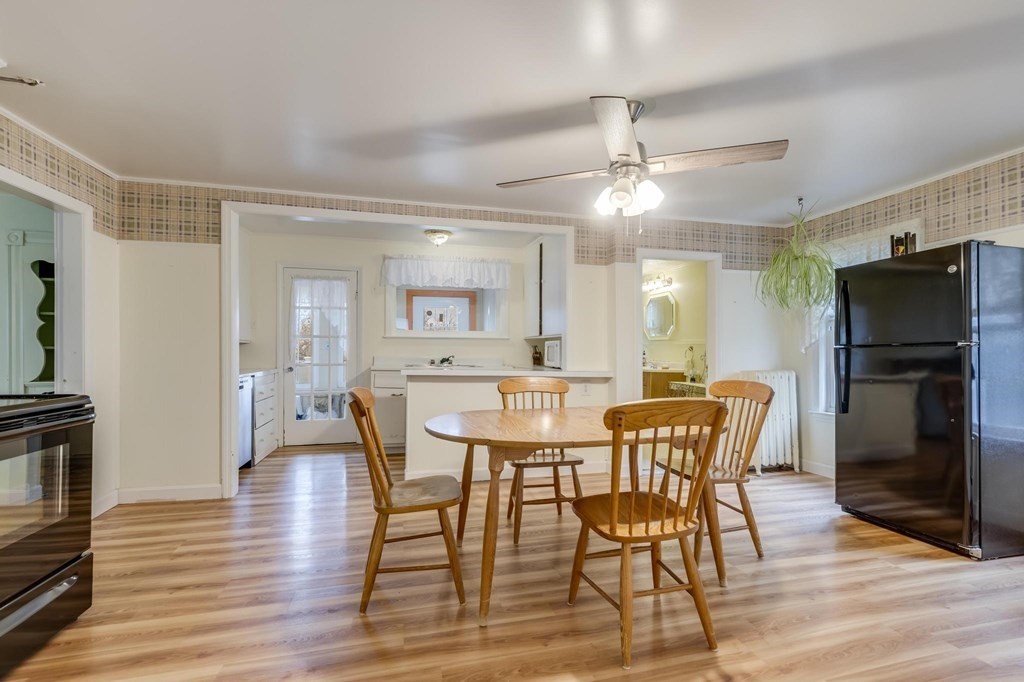 9 Trowbridge Circuit Worcester, MA 01603 - Photo 13 of 40 a view of a dining room with furniture window and wooden floor