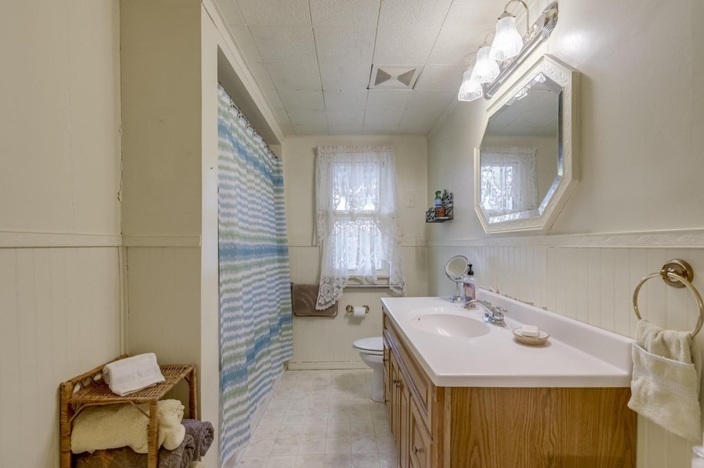 9 Trowbridge Circuit Worcester, MA 01603 - Photo 15 of 40 a bathroom with a sink and a mirror