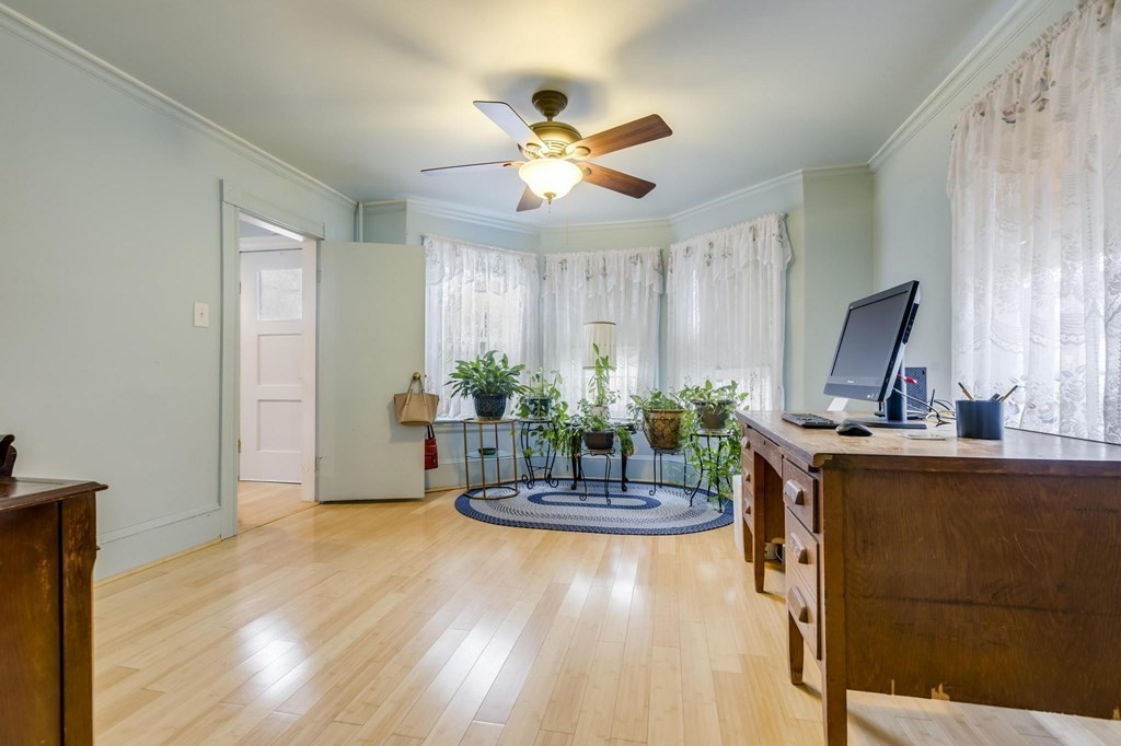 9 Trowbridge Circuit Worcester, MA 01603 - Photo 18 of 40 a view of a dining room with a table and chairs