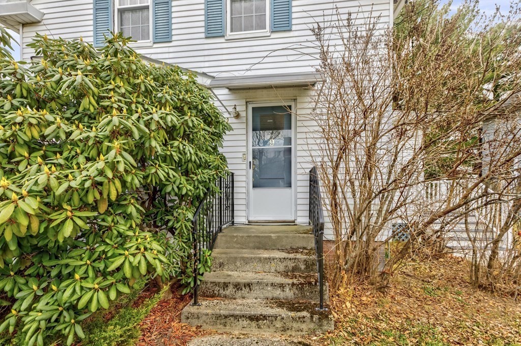 9 Trowbridge Circuit Worcester, MA 01603 - Photo 27 of 40 a front view of a house with a yard