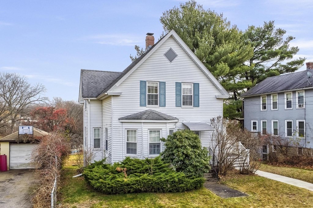 9 Trowbridge Circuit Worcester, MA 01603 - Photo 7 of 40 a front view of a house with a yard