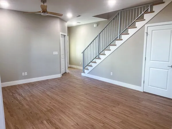 a view of entryway with wooden floor