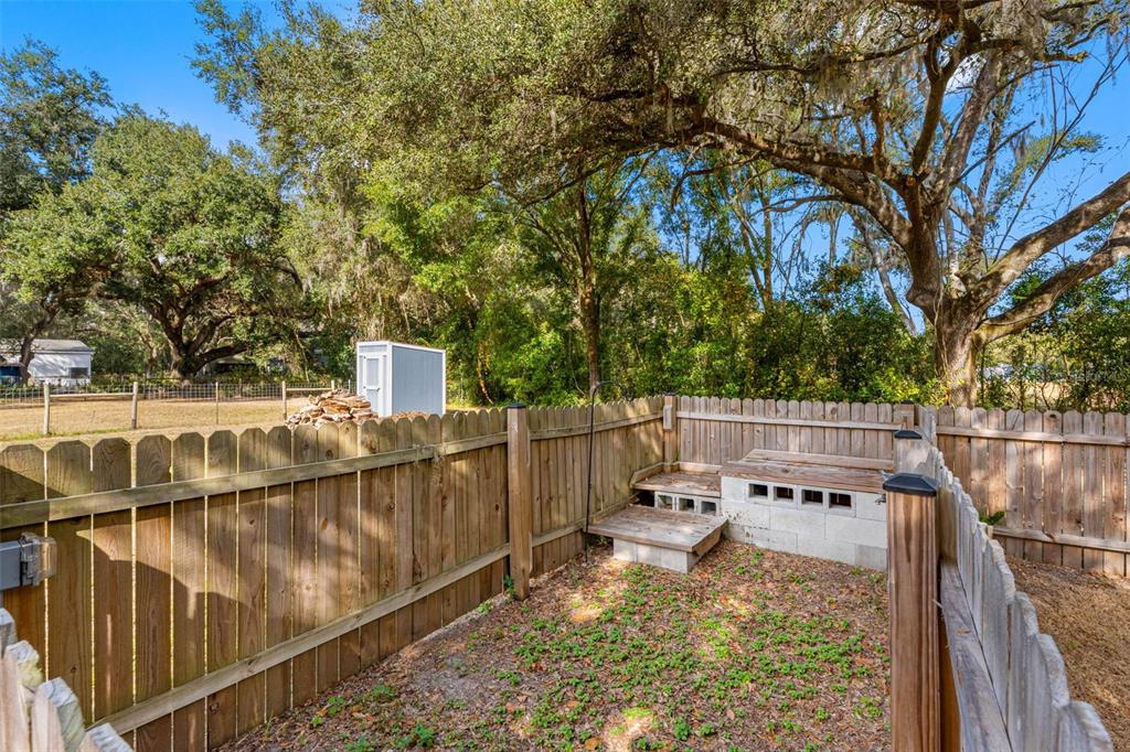 33237 Chancey Road Wesley Chapel, FL 33543 - Photo 38 of 59 a view of a balcony with two chairs
