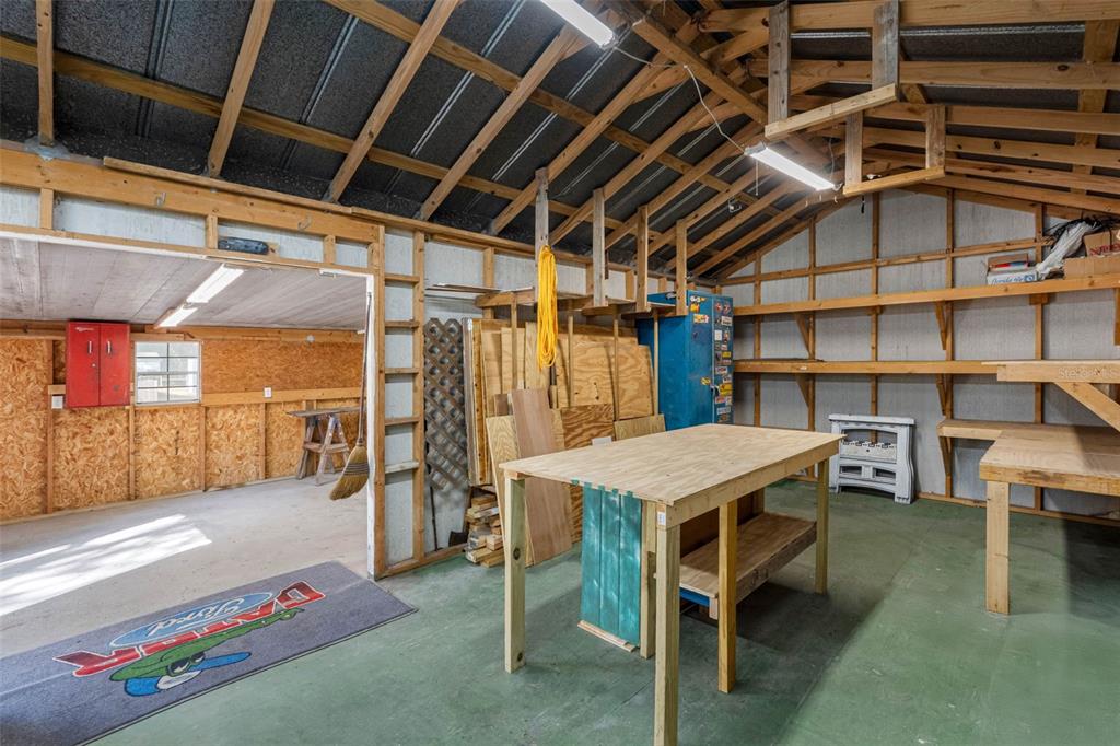 33237 Chancey Road Wesley Chapel, FL 33543 - Photo 42 of 59 a storage room with shelves