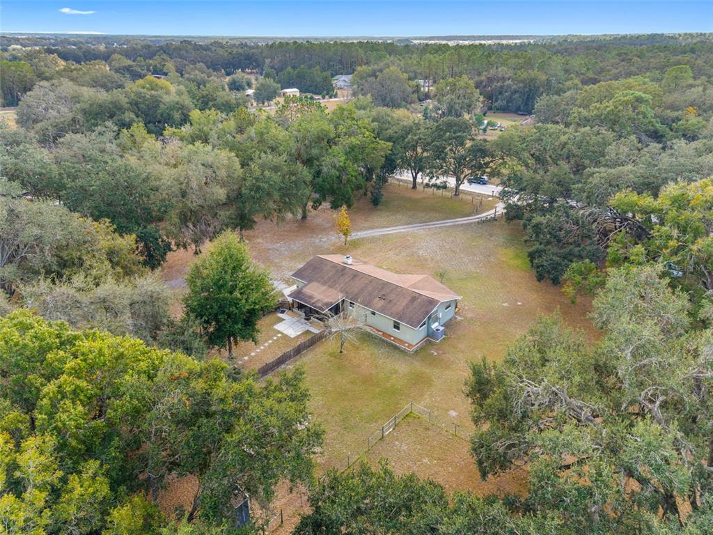33237 Chancey Road Wesley Chapel, FL 33543 - Photo 57 of 59 an aerial view of residential houses with outdoor space and river