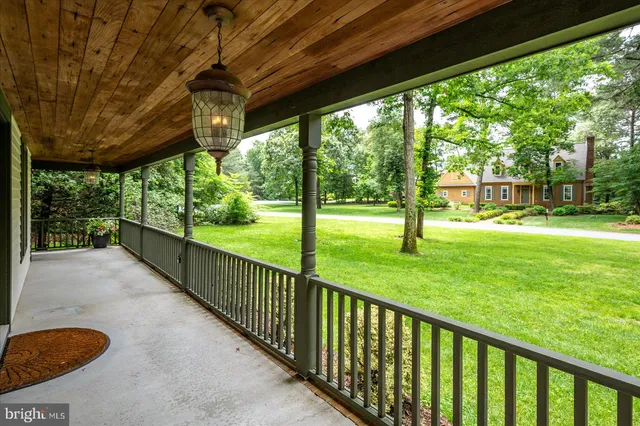 a view of a porch and garden