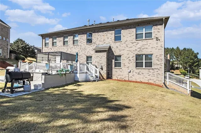 a front view of a house with a patio