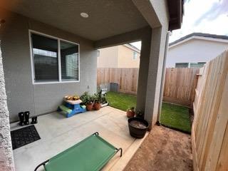 4106 Dennis Drive Clovis, CA 93619 - Photo 14 of 17 a view of a backyard with garden