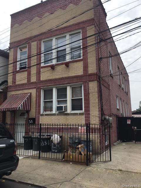 53-04 106th Street Queens, NY 11368 - Photo 3 of 8 a front view of a building
