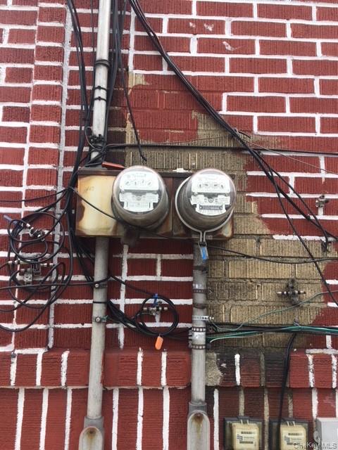 53-04 106th Street Queens, NY 11368 - Photo 5 of 8 a bathroom with a sink and a mirror