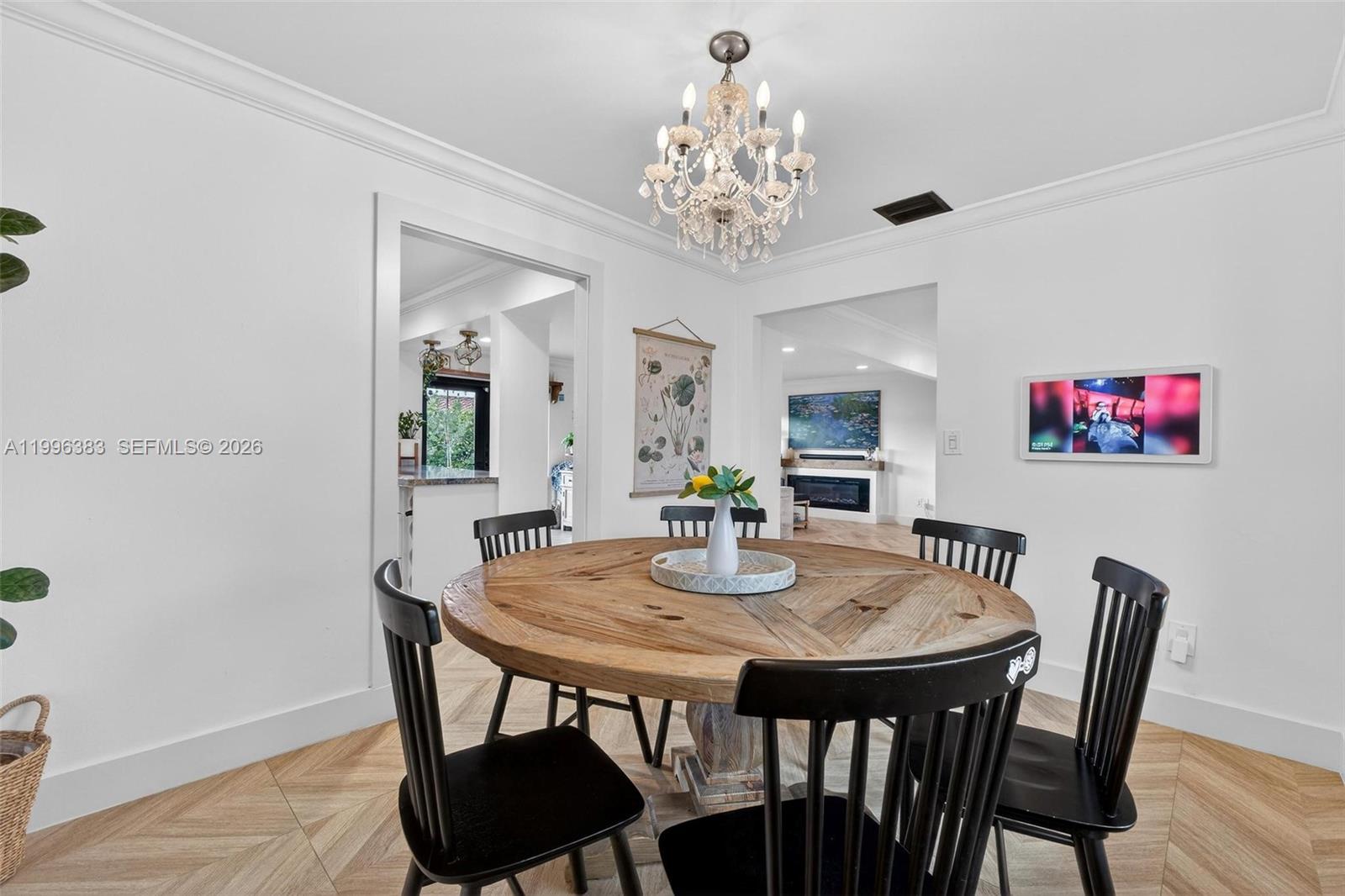 13441 Southwest 74th Street Miami, FL 33183 - Photo 19 of 51 a view of a dining room with furniture and wooden floor