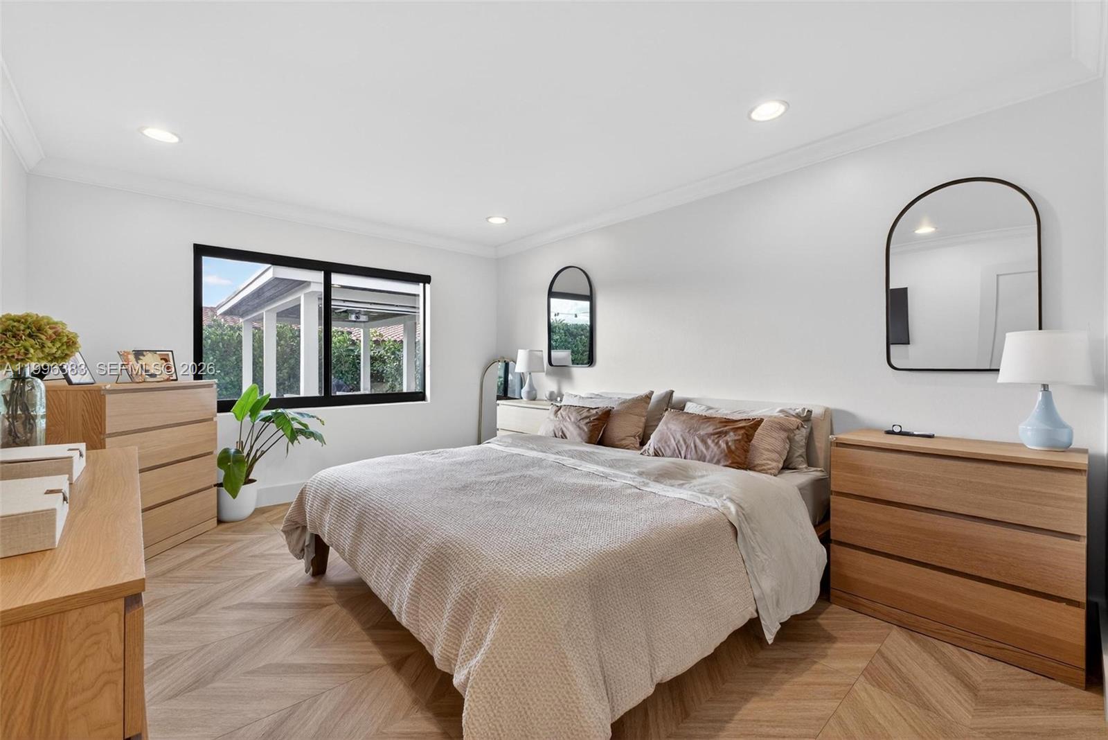 13441 Southwest 74th Street Miami, FL 33183 - Photo 20 of 51 a bedroom with bed a flat tv screen and dresser