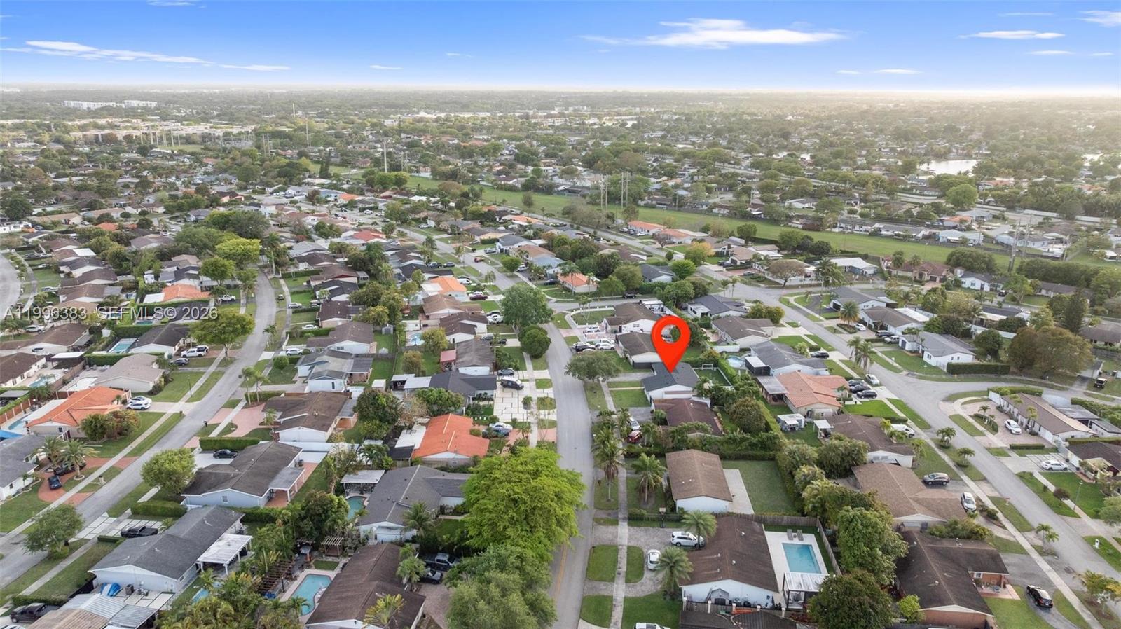 13441 Southwest 74th Street Miami, FL 33183 - Photo 46 of 51 an aerial view of residential building with green space