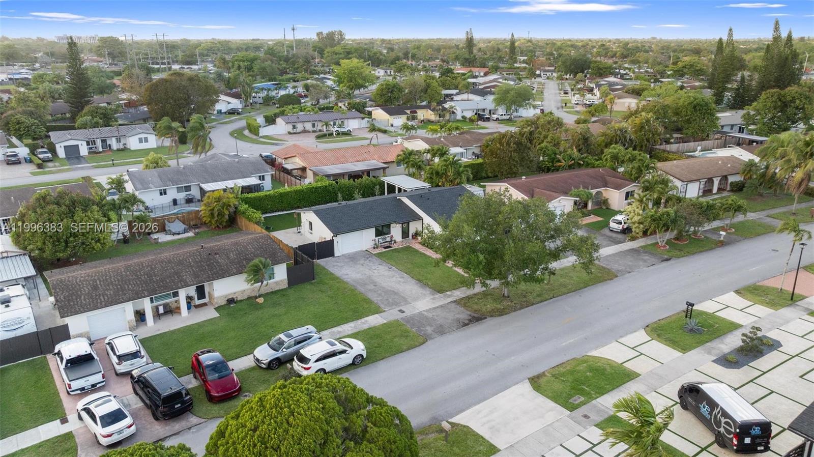 13441 Southwest 74th Street Miami, FL 33183 - Photo 48 of 51 an aerial view of multiple house with yard