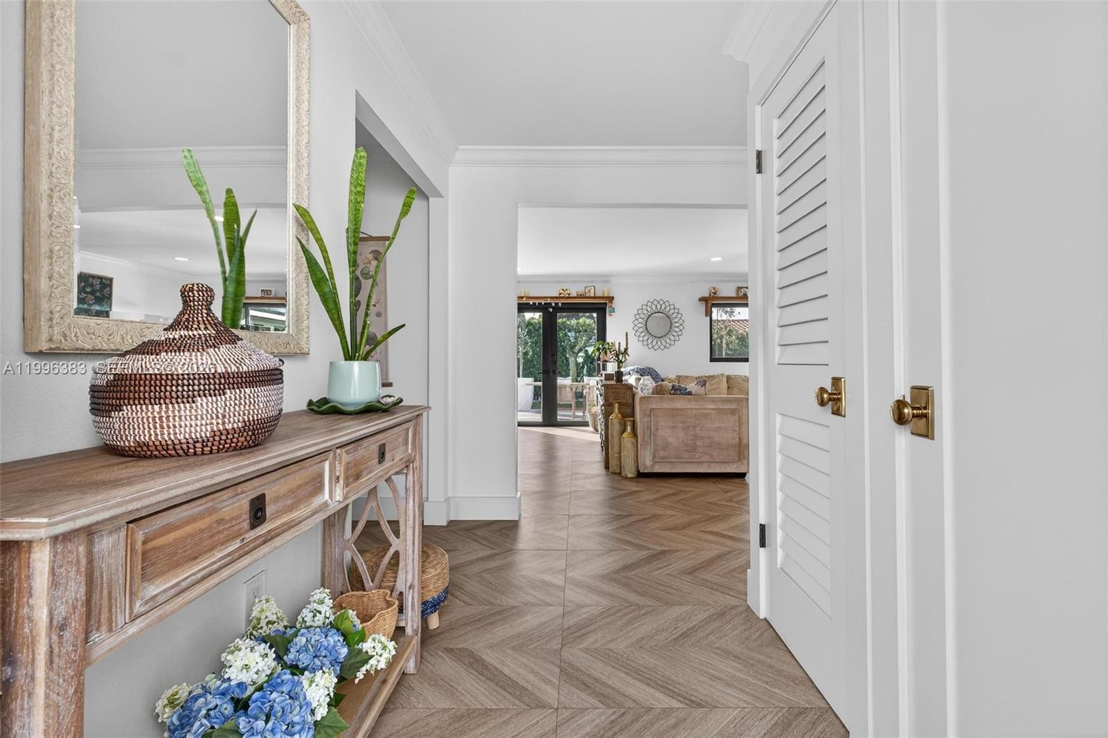 13441 Southwest 74th Street Miami, FL 33183 - Photo 5 of 51 a en suite bathroom with a granite countertop sink and a mirror
