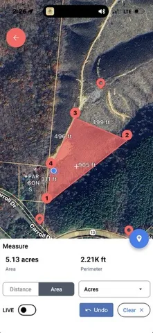 a picture of a bathroom with a glass door