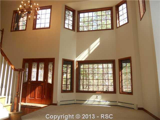 3620 Range View Road Monument, CO 80132 - Photo 2 of 21 Living room and entry