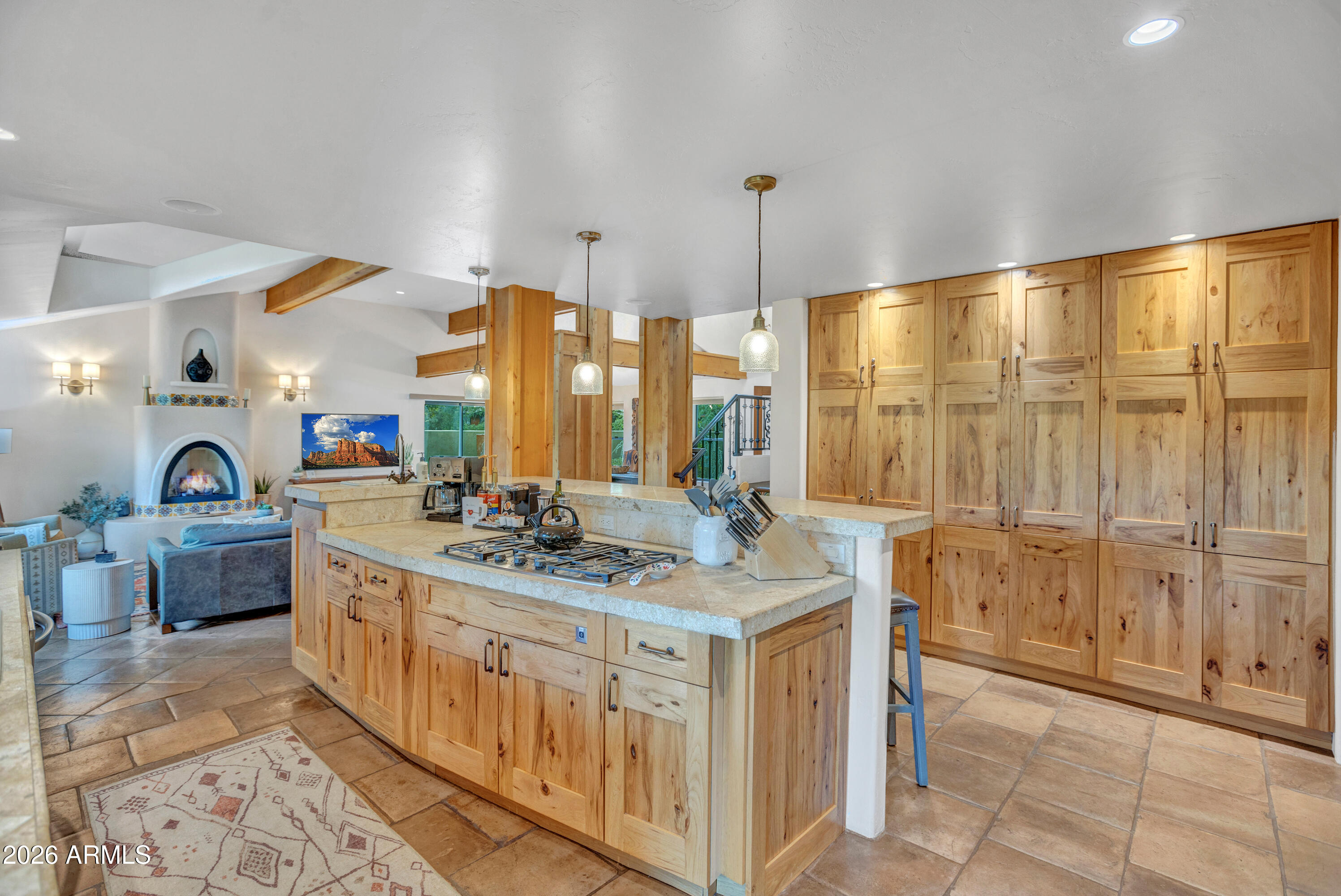 55 Ranch House Circle Sedona, AZ 86336 - Photo 17 of 61 a kitchen with stainless steel appliances granite countertop a stove a sink and a refrigerator