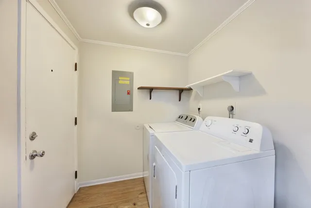 view of a house with a yard and garden