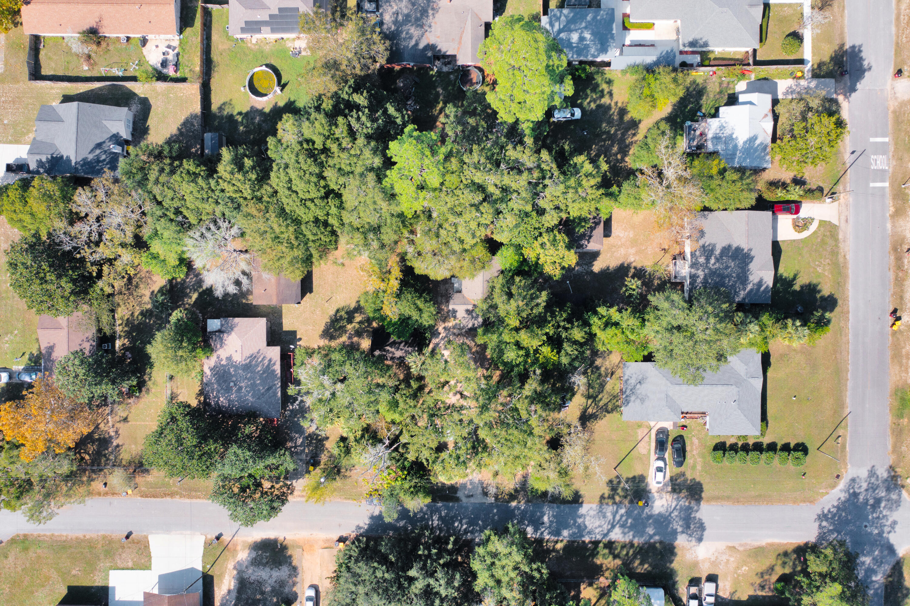 227 East 3rd Avenue Crestview, FL 32536 - Photo 25 of 26 an aerial view of residential houses with outdoor space