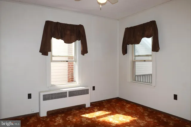 a view of an empty room with window
