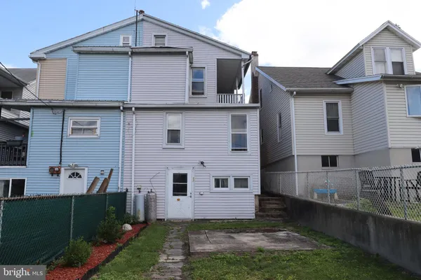 a front view of a house with a garage