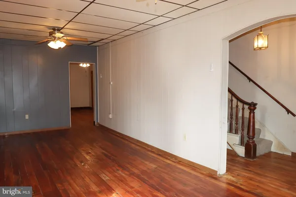 a view of a livingroom with wooden floor