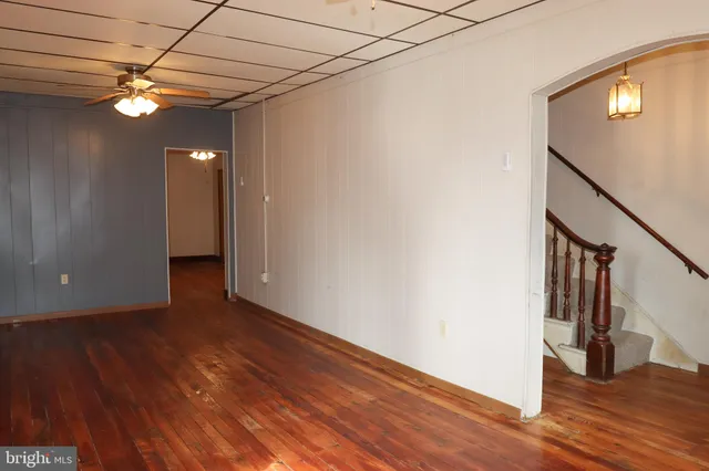 a view of a livingroom with wooden floor