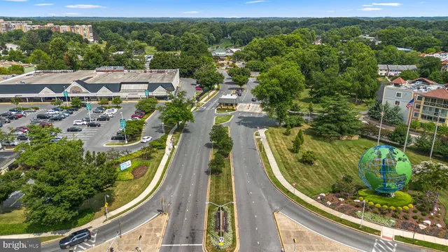 a view of a swimming pool with back yard