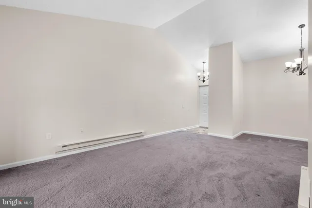 an empty room with an entryway