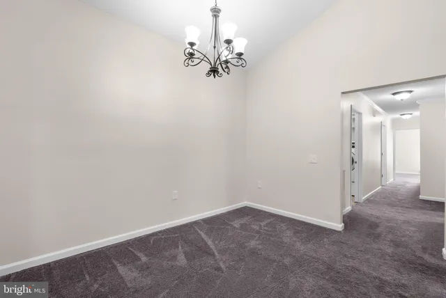 a view of a chandelier in big room