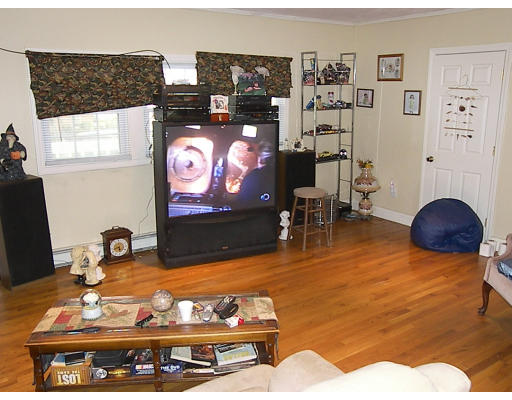 84 Mountford Road Hull, MA 02045 - Photo 14 of 30 a living room with furniture and flat screen tv