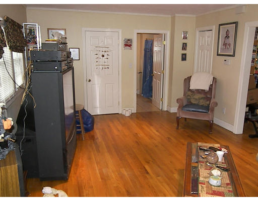 84 Mountford Road Hull, MA 02045 - Photo 17 of 30 a bedroom with a bed and furniture