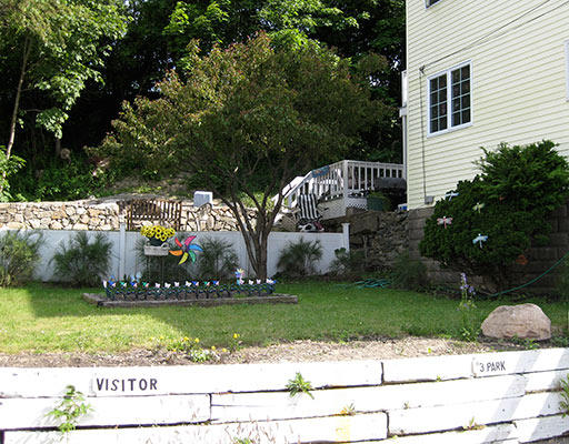 84 Mountford Road Hull, MA 02045 - Photo 8 of 30 a front view of a house with a garden