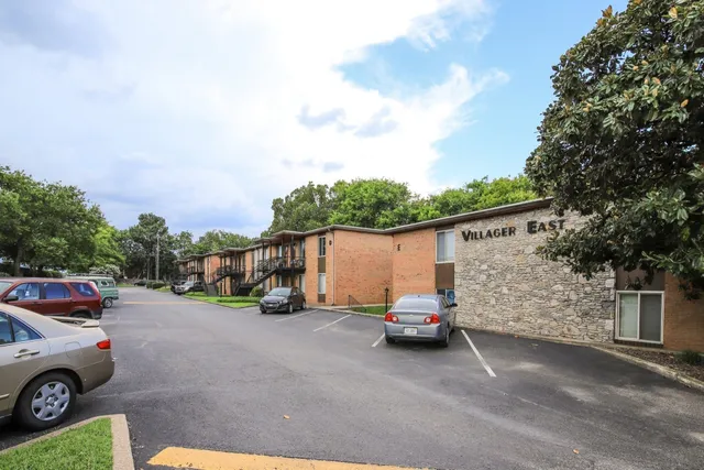 a view of car parked in front of house