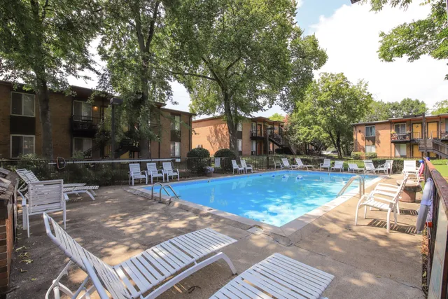 a view of a patio with swimming pool