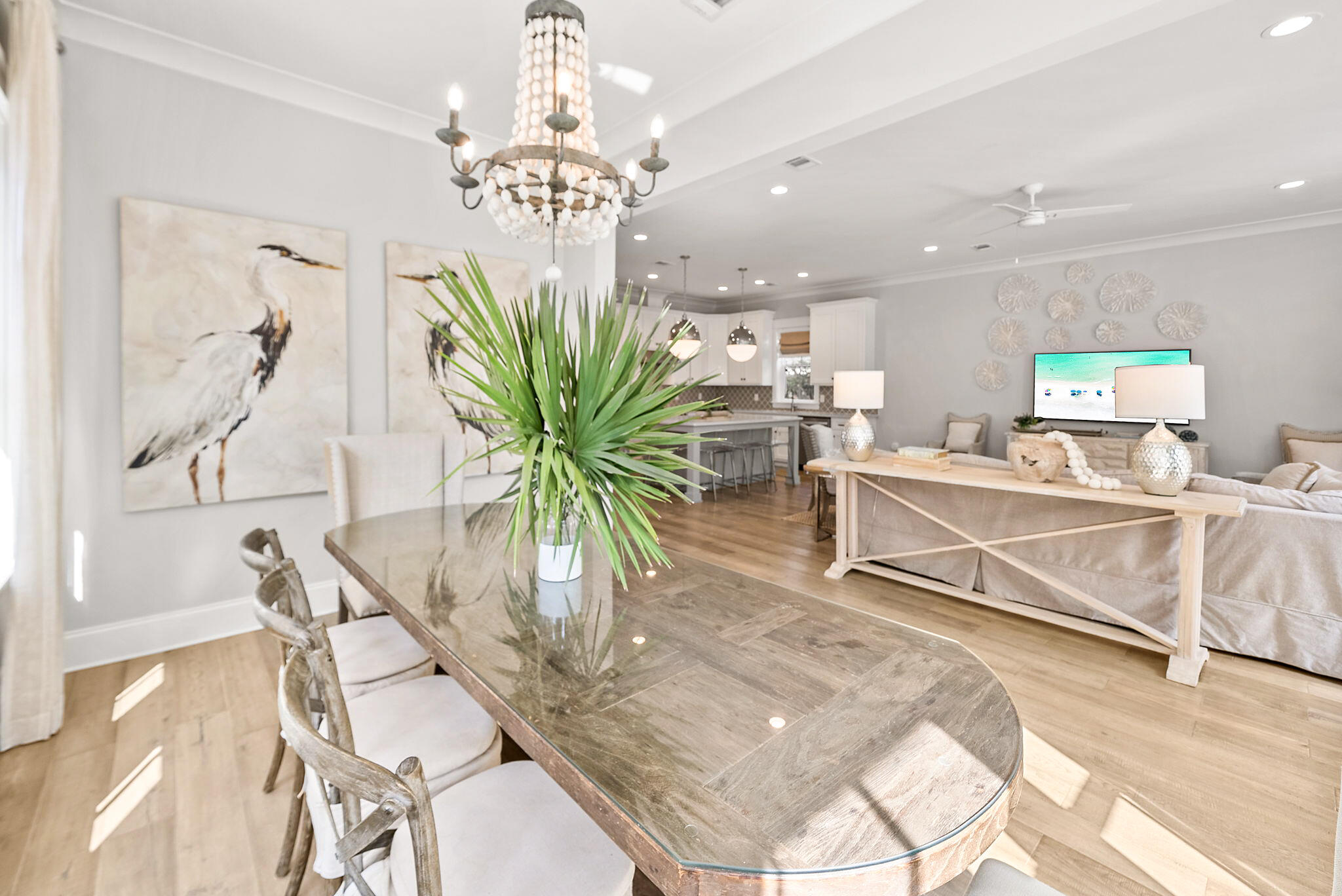 76 Brown Street Santa Rosa Beach, FL 32459 - Photo 12 of 48 a dining room with furniture and a chandelier