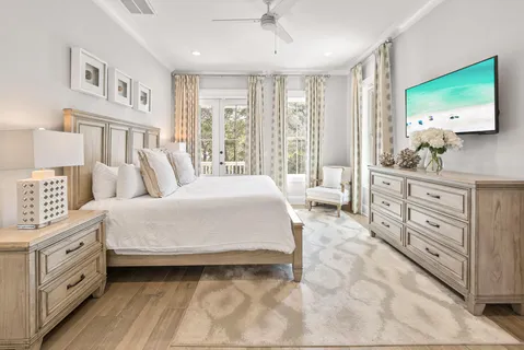 a bedroom with a bed and a couch