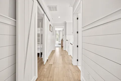 a bedroom with a large bed and a couch