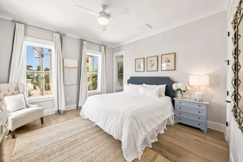 a spacious bedroom with a bed and a view of bathroom