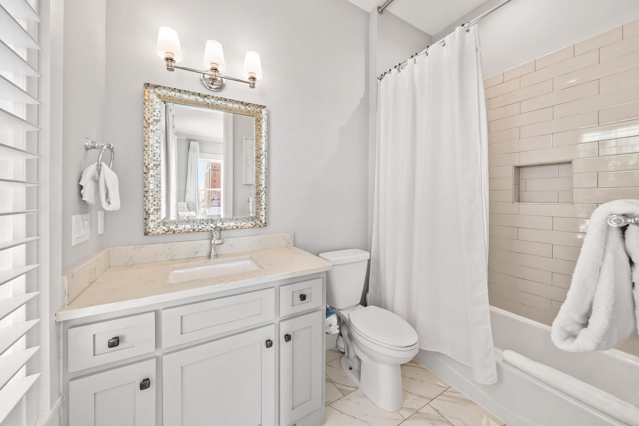 76 Brown Street Santa Rosa Beach, FL 32459 - Photo 35 of 48 a bathroom with a sink toilet and shower