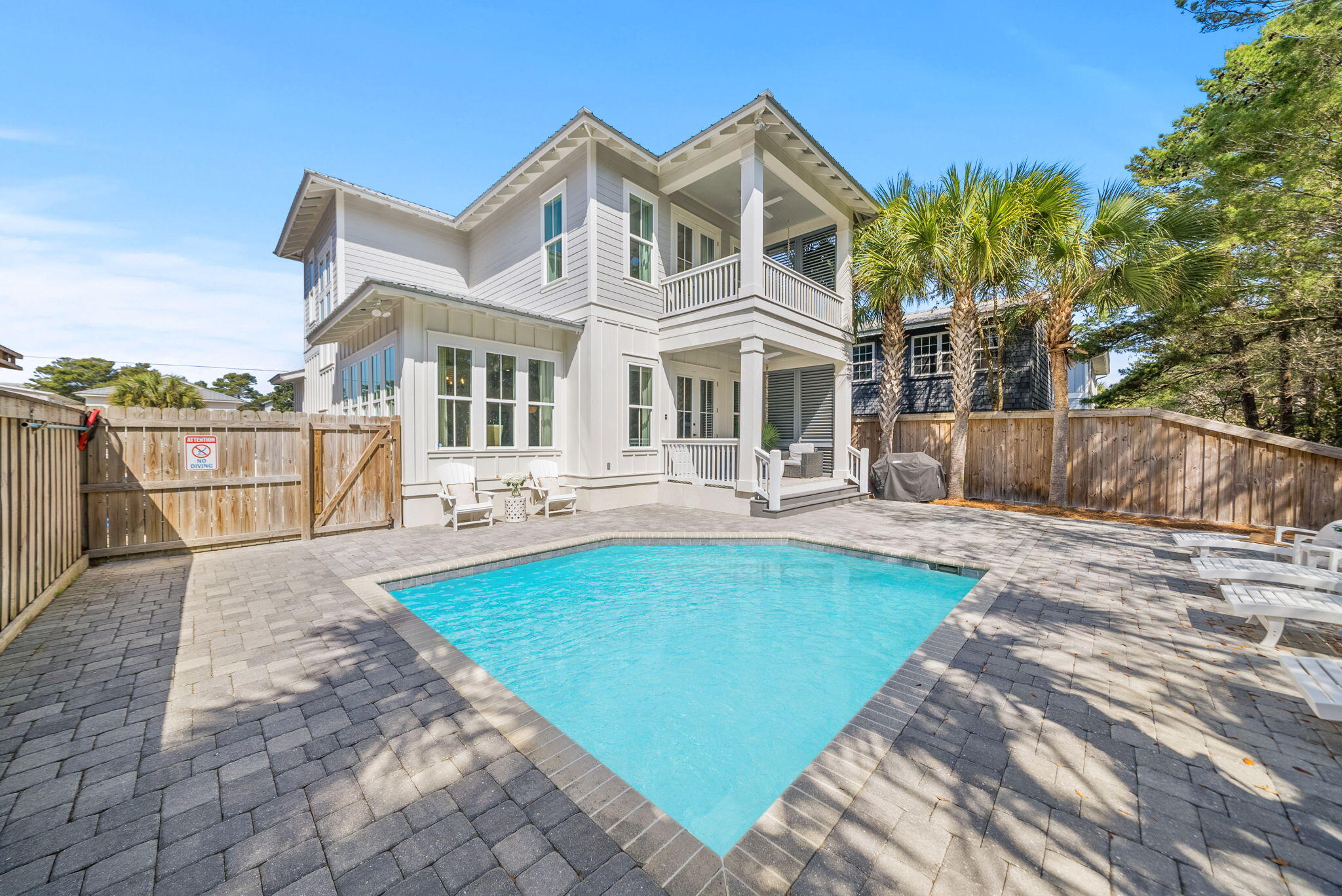 76 Brown Street Santa Rosa Beach, FL 32459 - Photo 37 of 48 a view of a house with swimming pool and sitting area