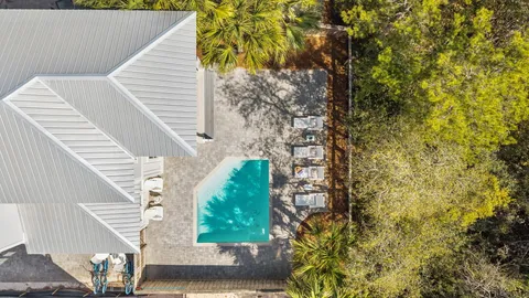 a living room with furniture window and flat screen tv
